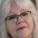 Christine Aros, PhD Agent